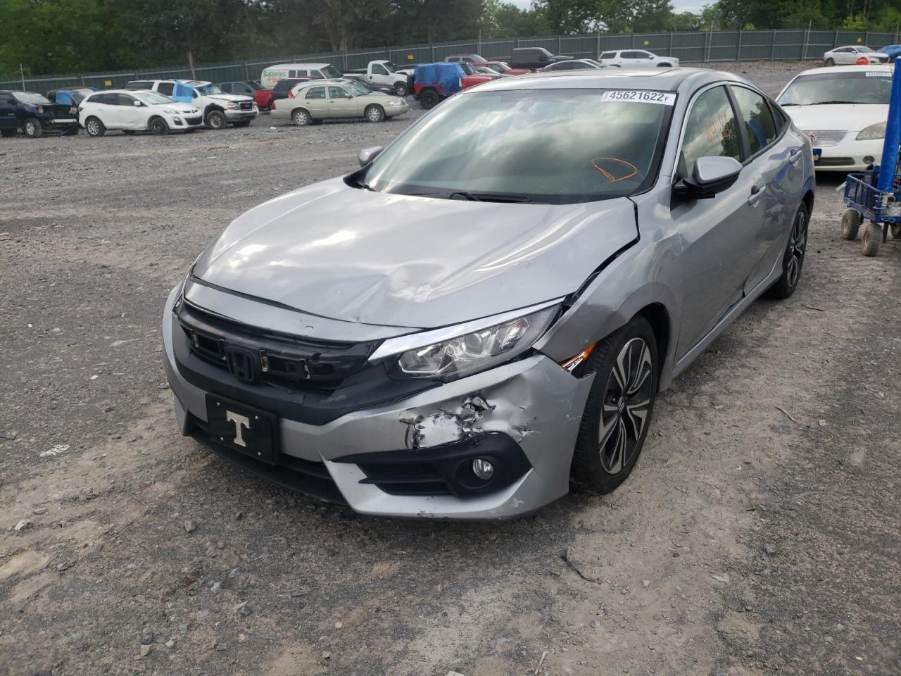 Photo 2 from auction – 2018 HONDA CIVIC EX with VIN JHMFC1F36JX042544