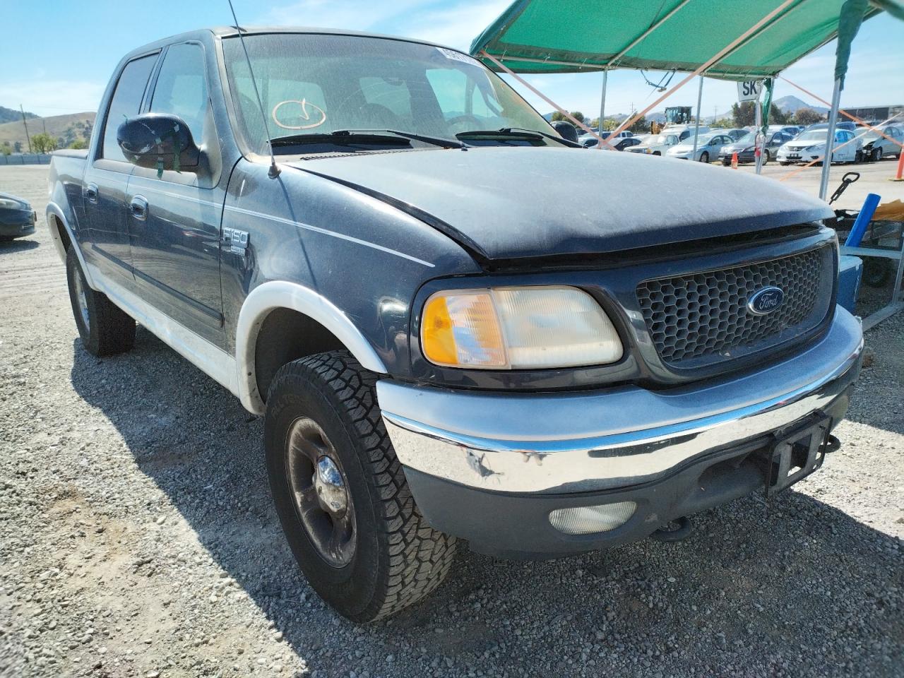 Photo 9 from auction – 2001 FORD F150 SUPER with VIN 1FTRW08LX1KE87749