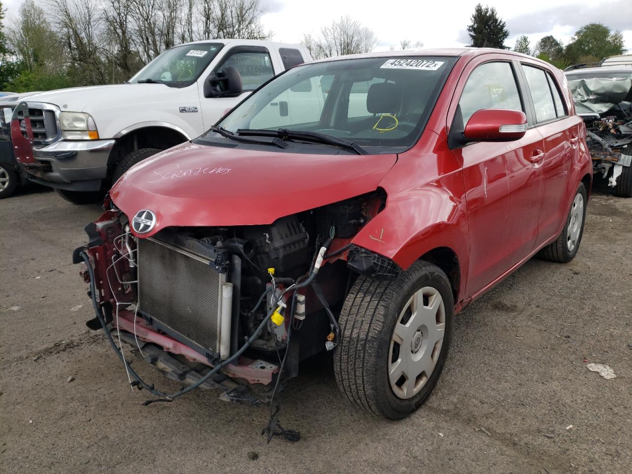 Photo 2 from auction – 2010 TOYOTA SCION XD with VIN JTKKU4B49A1006923