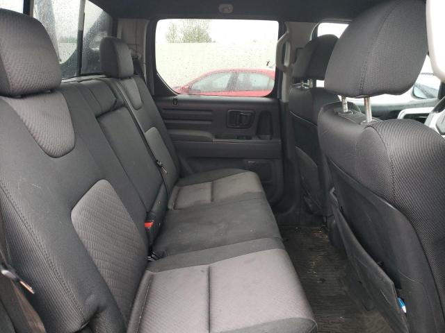 Photo 8 from auction – 2005 HONDA RIDGELINE with VIN 2HJYK16486H573614