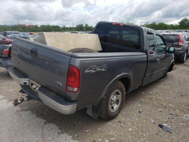 Photo 4 from auction – 2003 FORD F150 with VIN 2FTRX18W73CA40249