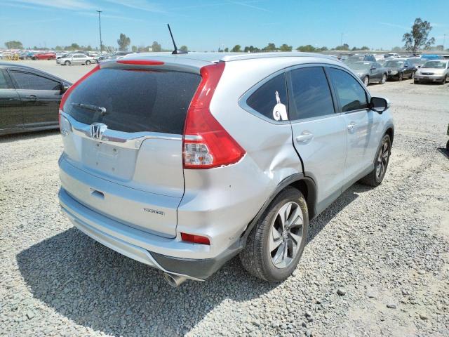 Photo 9 from auction – 2015 HONDA CR-V TOURI with VIN 5J6RM3H98FL018280