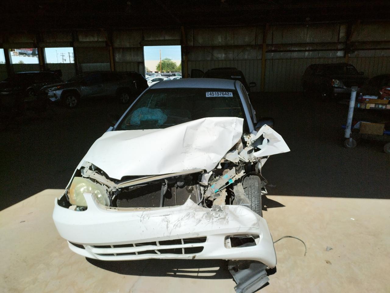 Photo 9 from auction – 2003 TOYOTA COROLLA CE with VIN 1NXBR32EX32090825