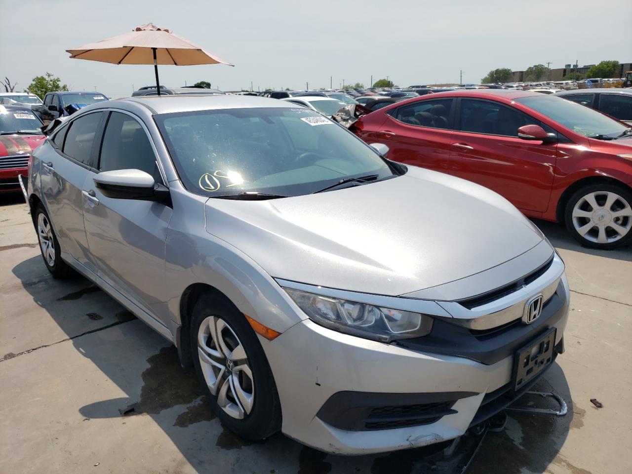 HONDA CIVIC LX 2016 with VIN 19XFC2F50GE035932 - Photo from auction