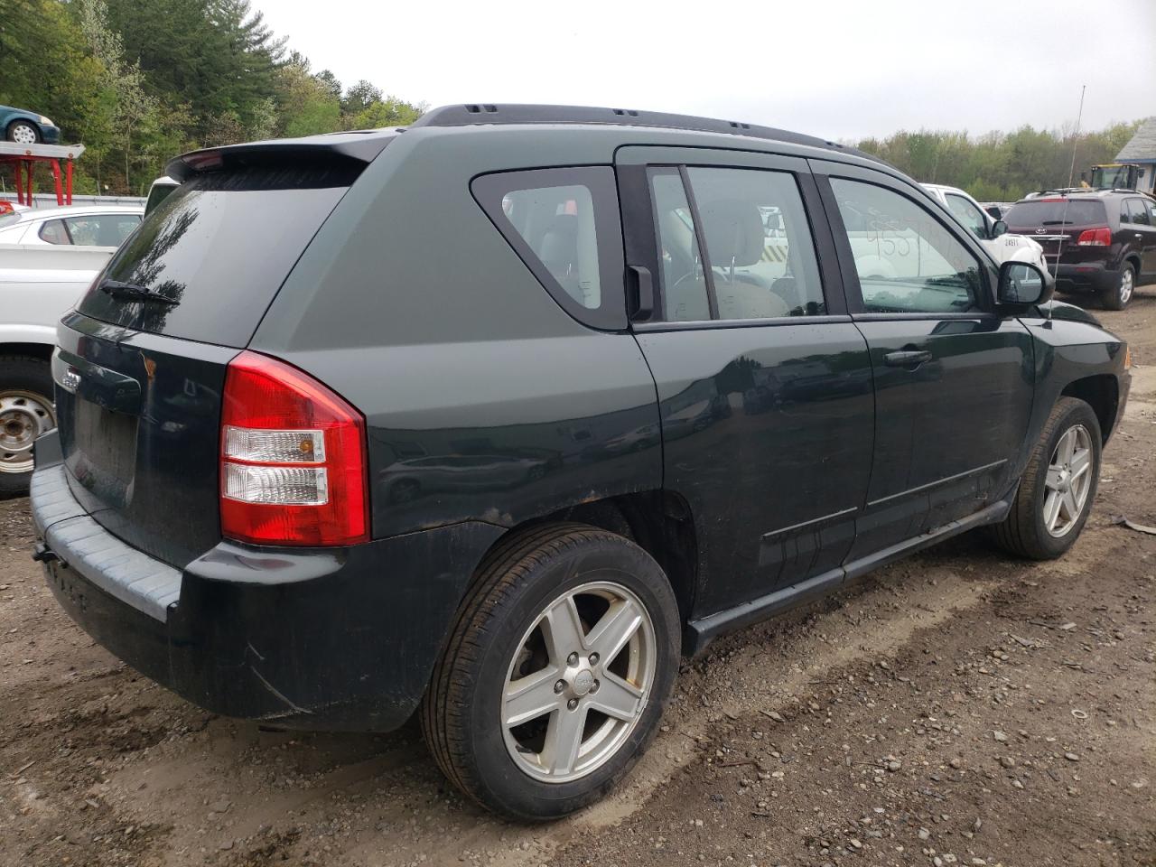 Photo 17 from auction – 2010 JEEP COMPASS SP with VIN 1J4NF4FB6AD589256