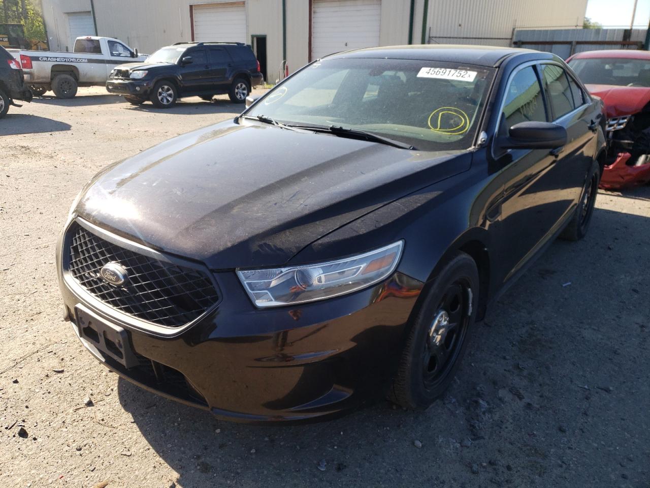 Photo 2 from auction – 2014 FORD TAURUS POL with VIN 1FAHP2MK4EG153569