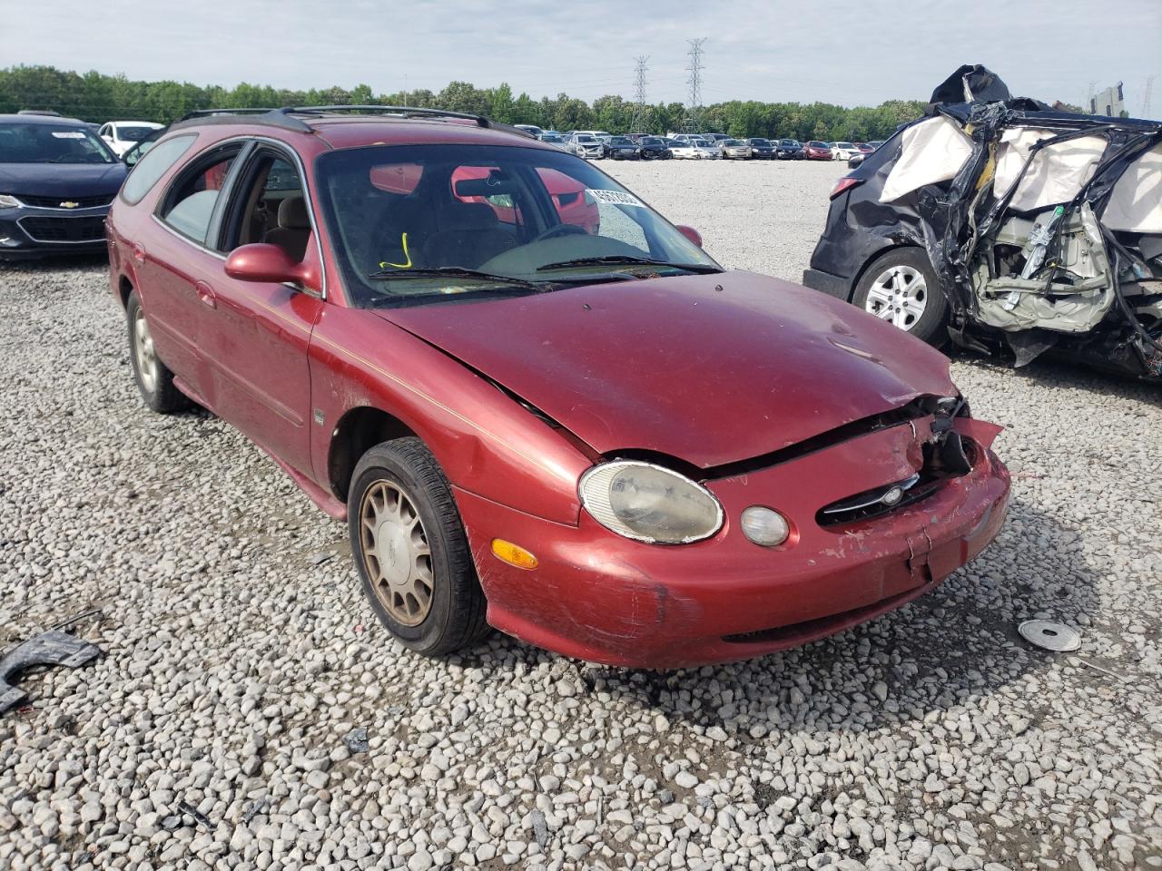 FORD TAURUS SE 1999 with VIN 1FAFP58S8XA158279 - Photo from auction