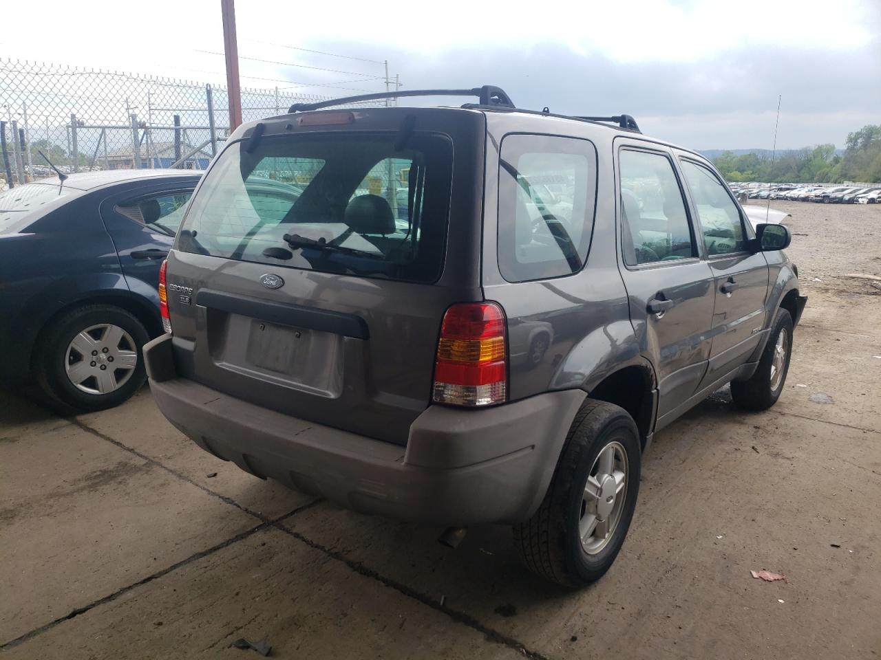 Photo 4 from auction – 2002 FORD ESCAPE XLS with VIN 1FMYU01162KC16050