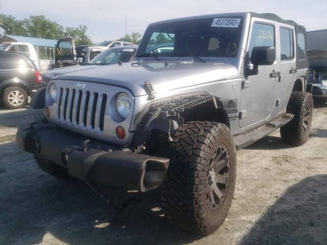Photo 2 from auction – 2013 JEEP WRANGLER U with VIN 1C4BJWDG9DL673907
