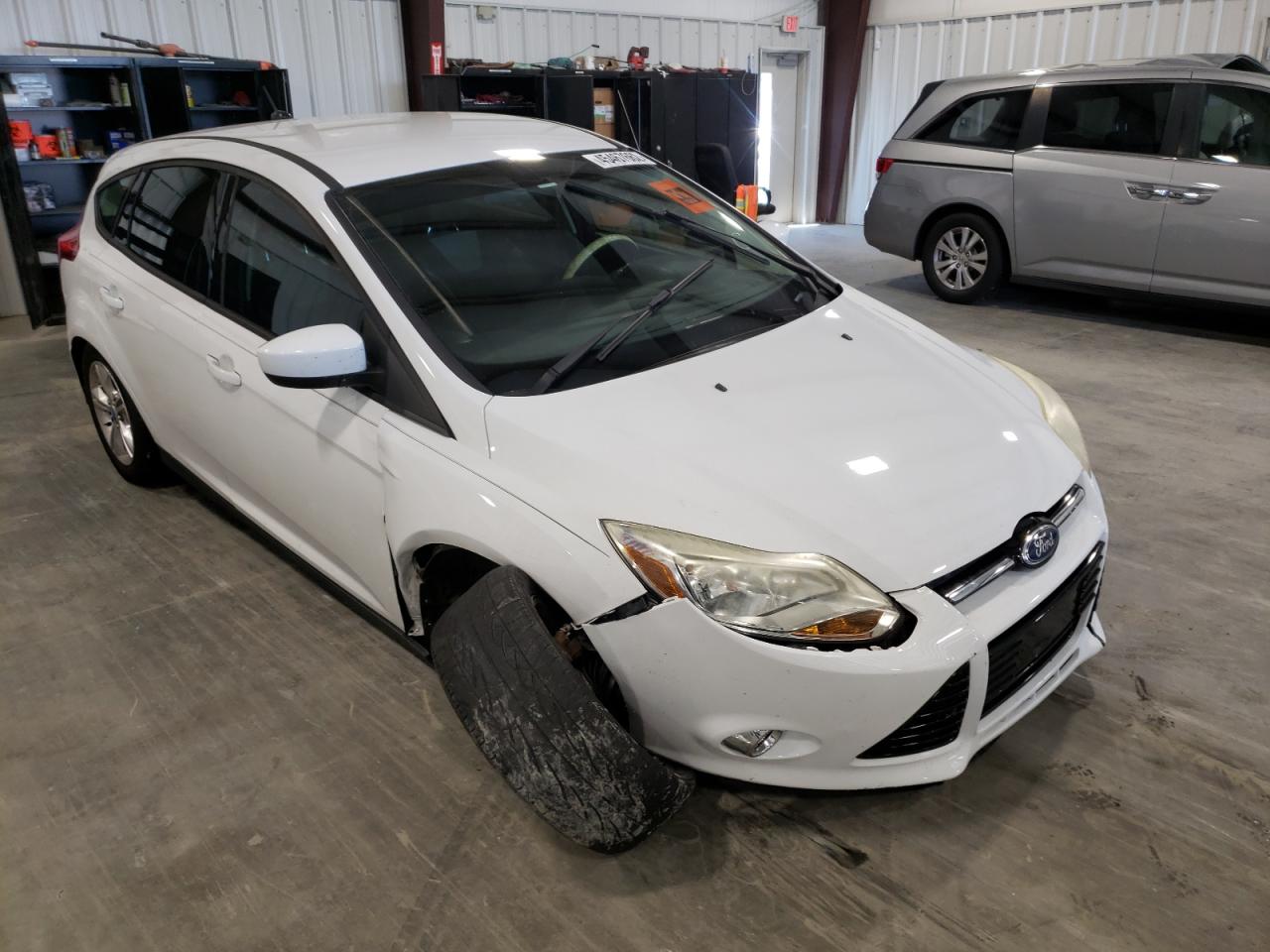 FORD FOCUS SE 2012 with VIN 1FAHP3K29CL224665 - Photo from auction
