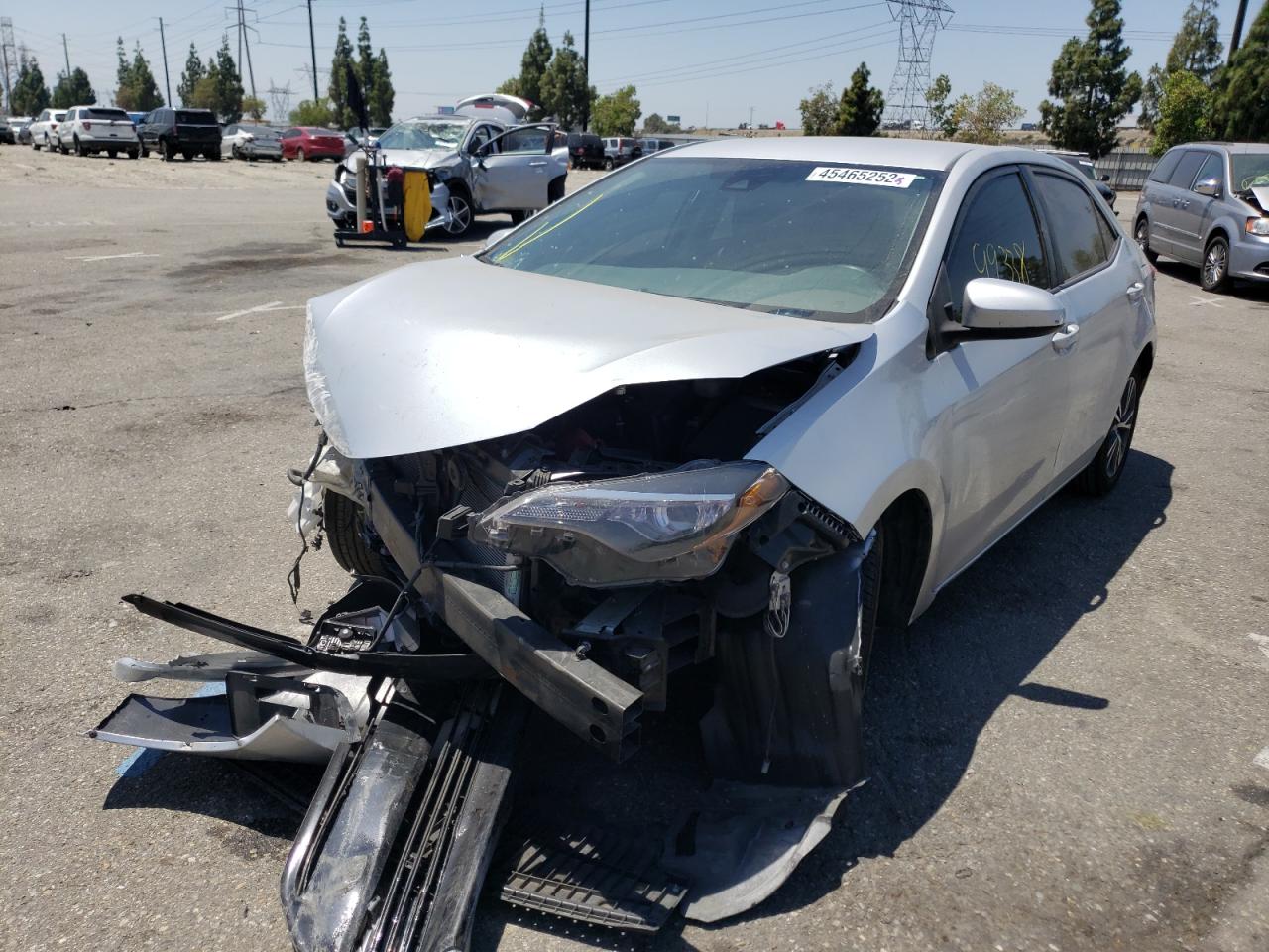 Photo 2 from auction – 2017 TOYOTA COROLLA L with VIN 5YFBURHE6HP611301