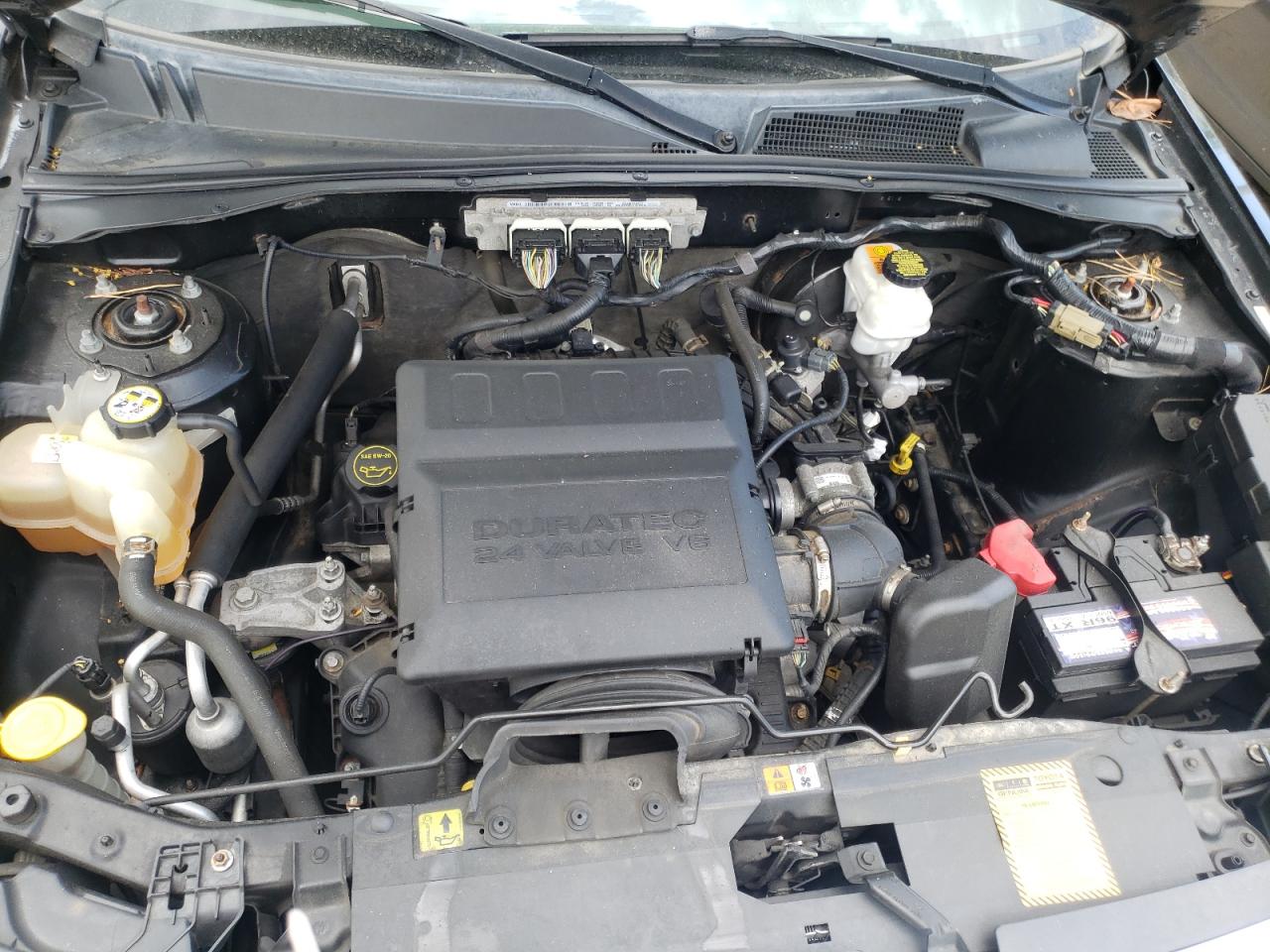 Photo 7 from auction – 2009 FORD ESCAPE LIM with VIN 1FMCU94G29KC33906