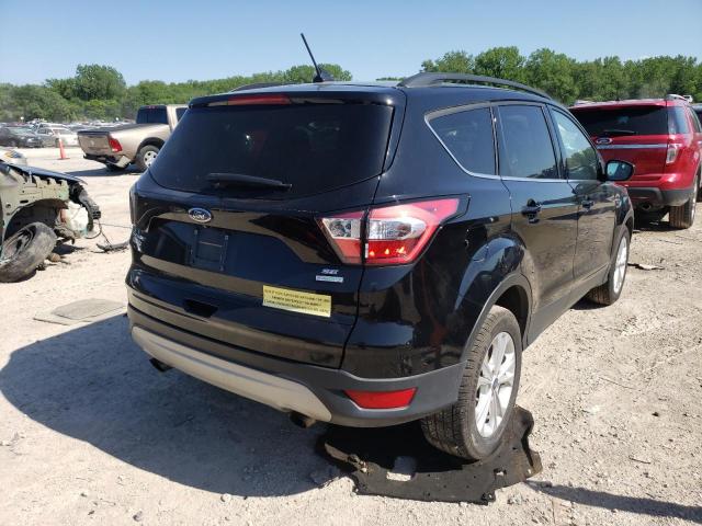 Photo 4 from auction – 2018 FORD ESCAPE SE with VIN 1FMCU0GD7JUA52659