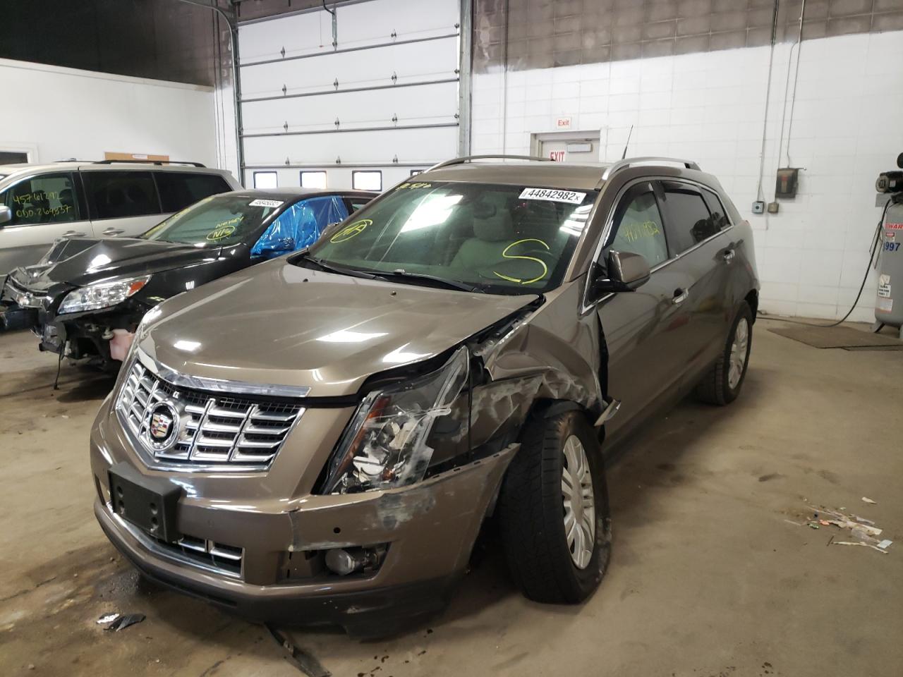 Photo 2 from auction – 2014 CADILLAC SRX LUXURY with VIN 3GYFNEE3XES566527