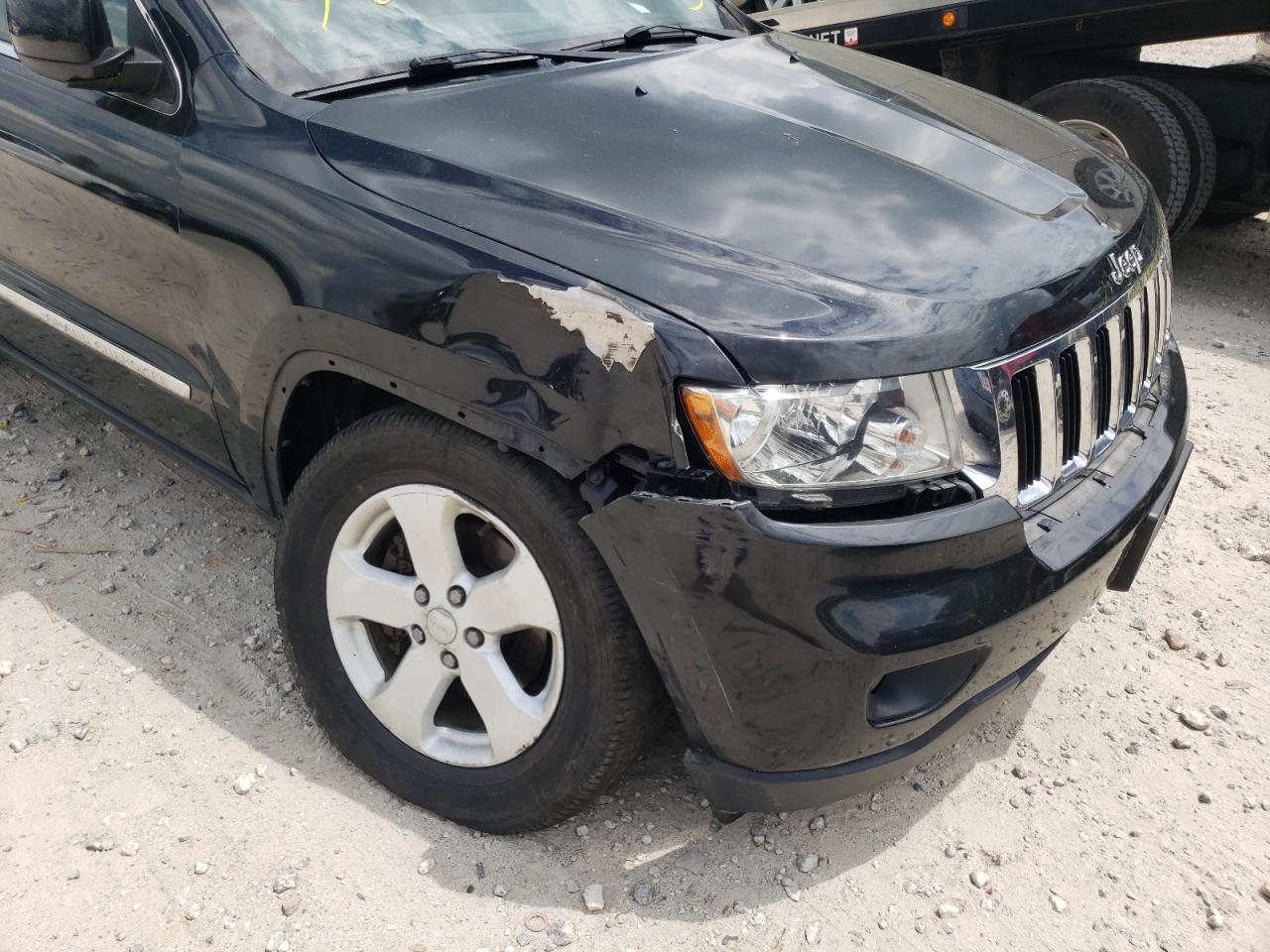 Photo 9 from auction – 2012 JEEP GRAND CHER with VIN 1C4RJFAGXCC268009