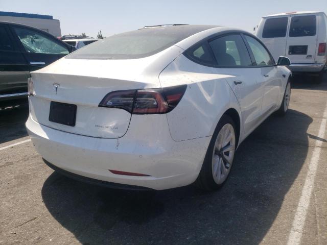 Photo 4 from auction – 2022 TESLA MODEL 3 with VIN 5YJ3E1EB9NF144654