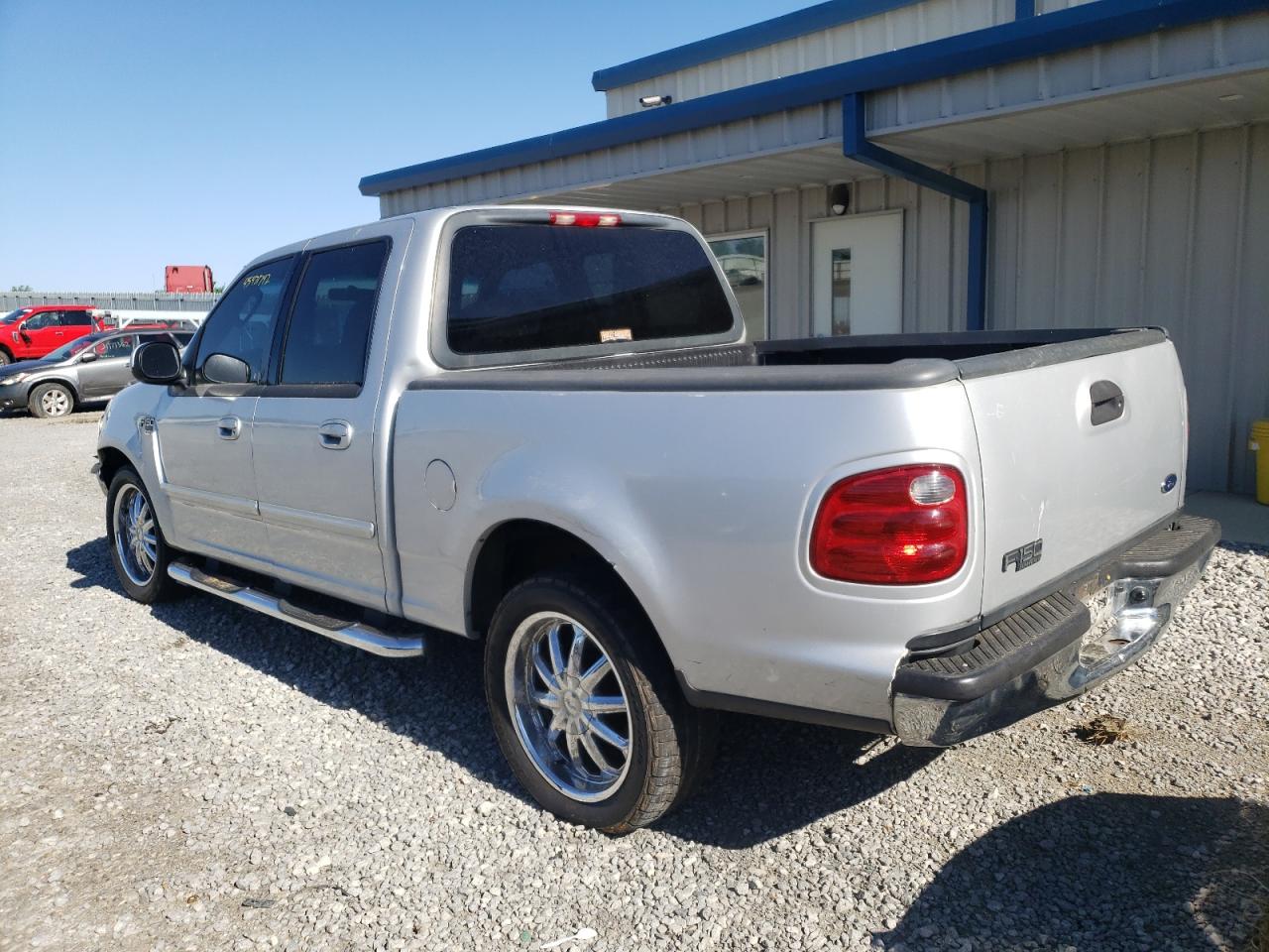 Photo 3 from auction – 2002 FORD F150 SUPER with VIN 1FTRW076X2KD61842