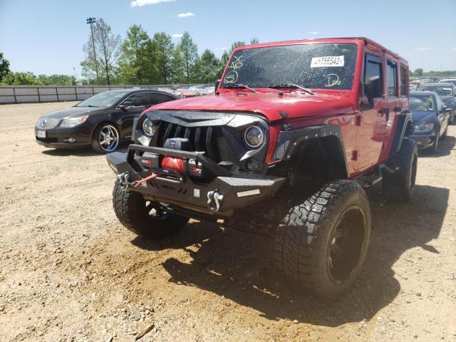 Photo 2 from auction – 2011 JEEP WRANGLER U with VIN 1J4BA5H12BL560727