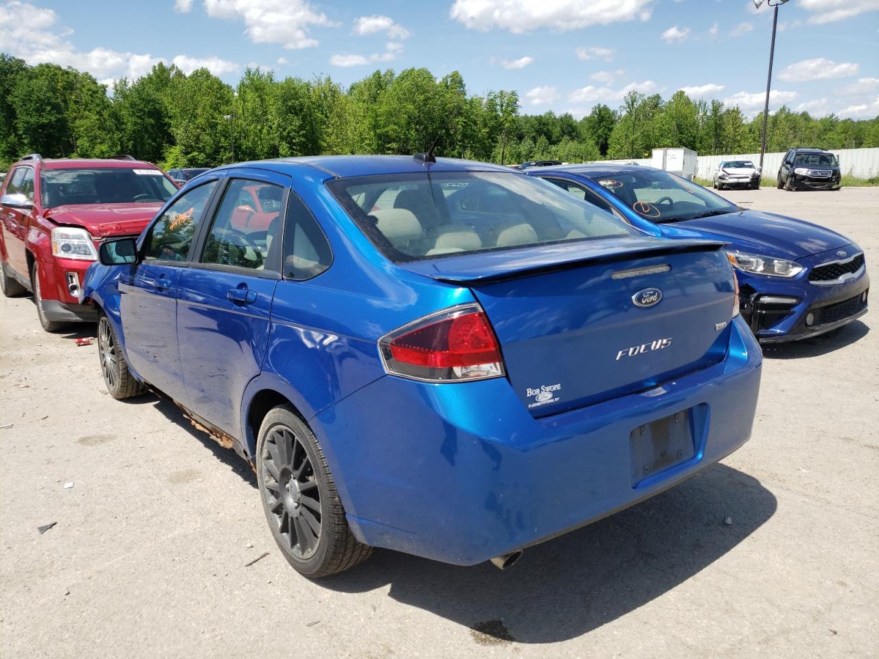 Photo 3 from auction – 2011 FORD FOCUS SES with VIN 1FAHP3GN7BW124595