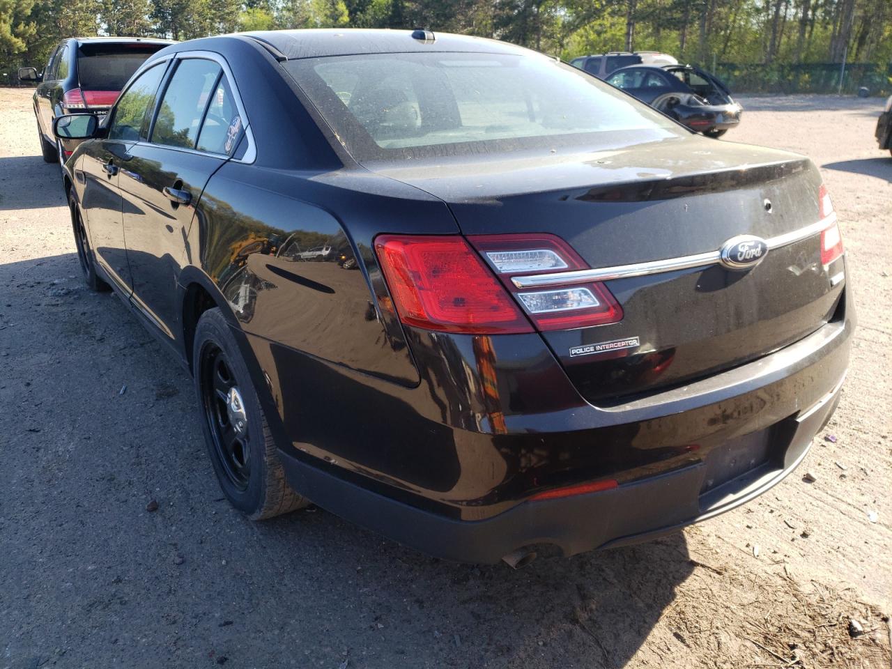 Photo 3 from auction – 2014 FORD TAURUS POL with VIN 1FAHP2MK4EG153569