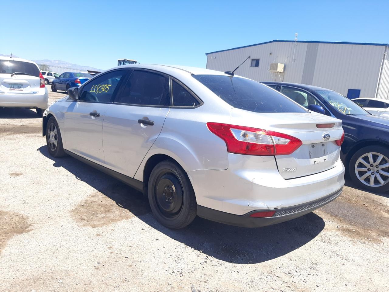 Photo 3 from auction – 2014 FORD FOCUS S with VIN 1FADP3E25EL231187
