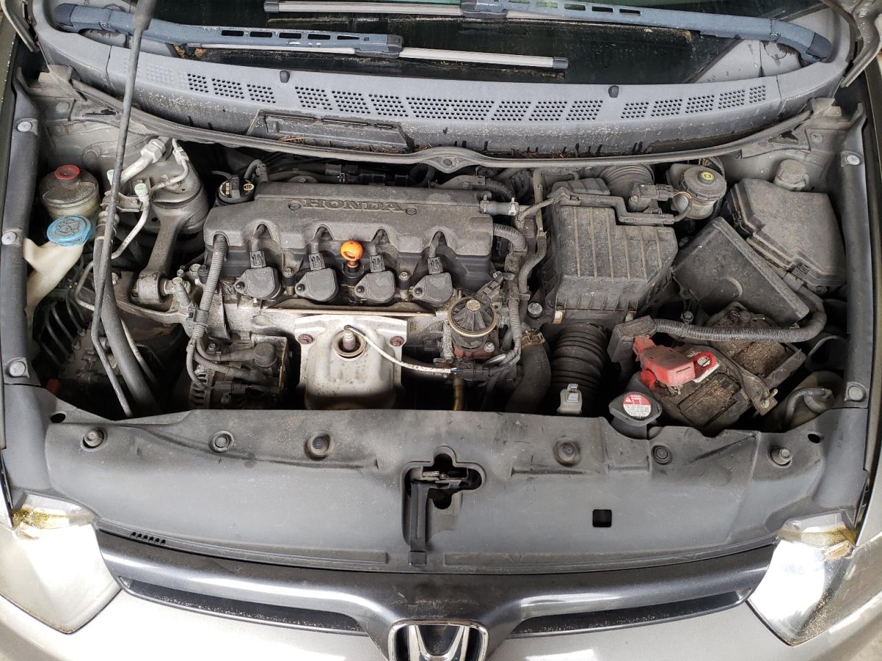 Photo 7 from auction – 2007 HONDA CIVIC LX with VIN 2HGFG11617H569834