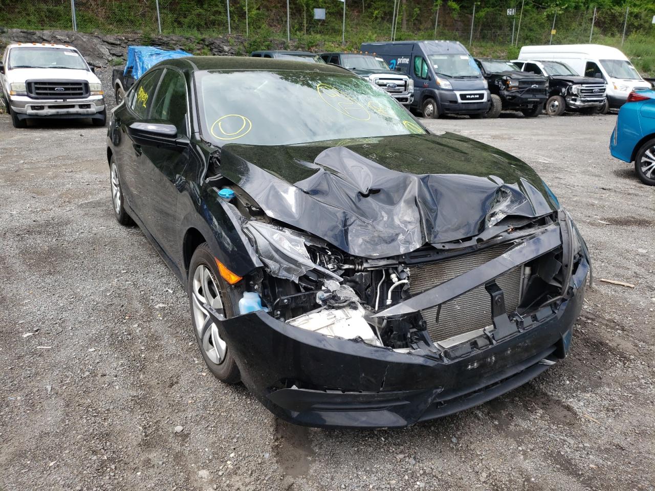 HONDA CIVIC LX 2018 with VIN 2HGFC2F55JH598732 - Photo from auction