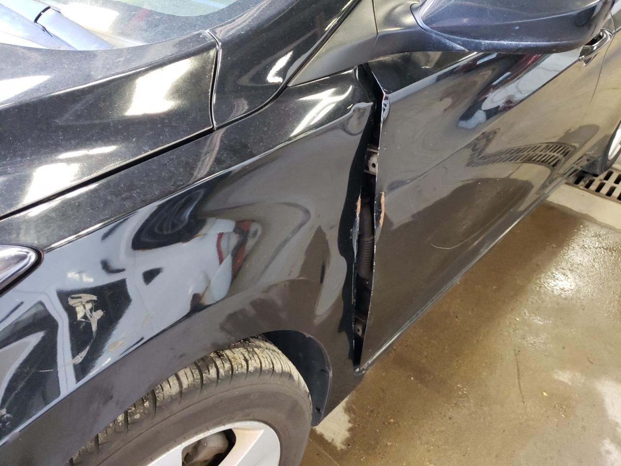 Photo 9 from auction – 2011 HYUNDAI ELANTRA GL with VIN KMHDH4AE5BU103126