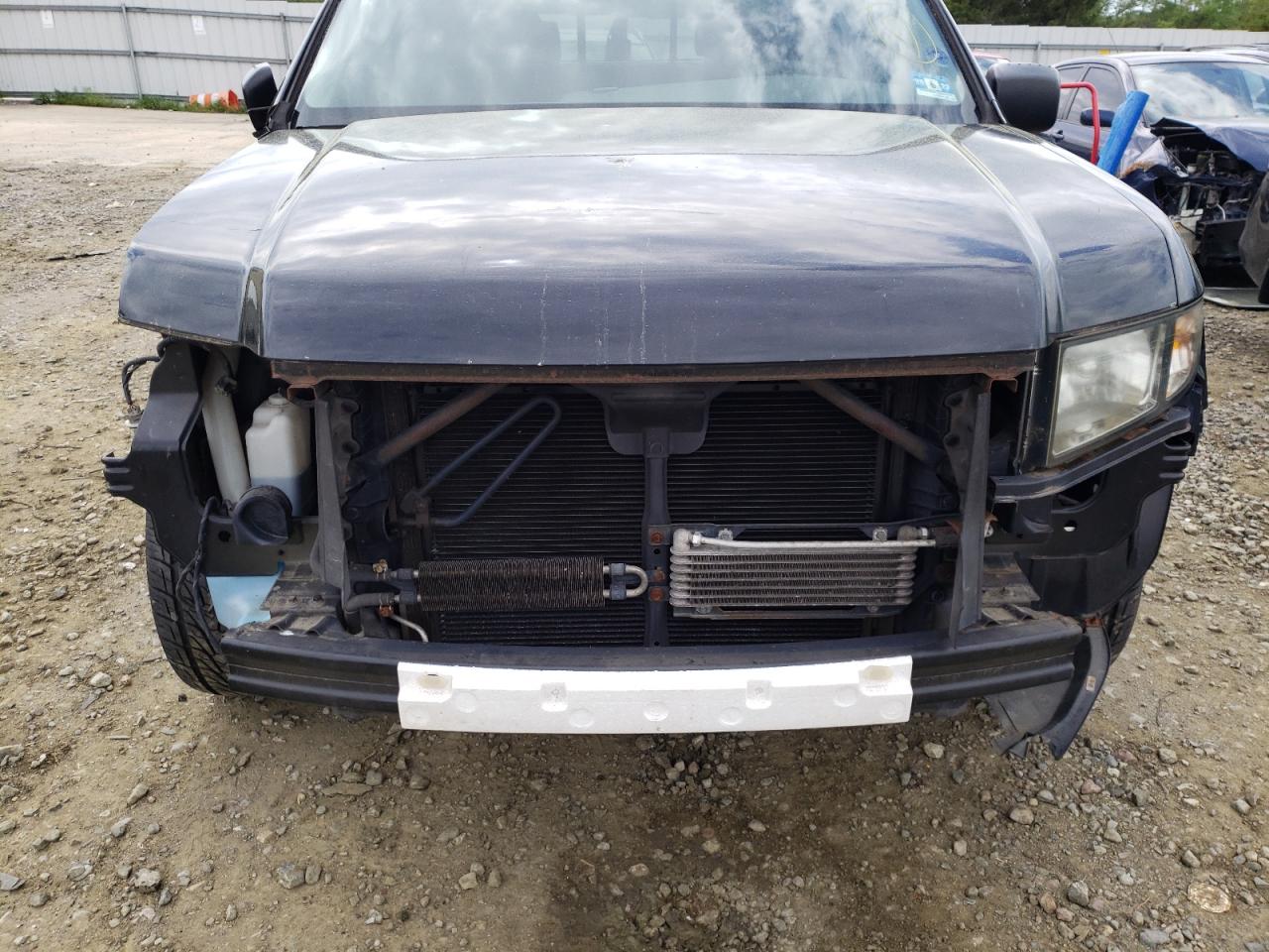 Photo 9 from auction – 2007 HONDA RIDGELINE with VIN 2HJYK16237H551875