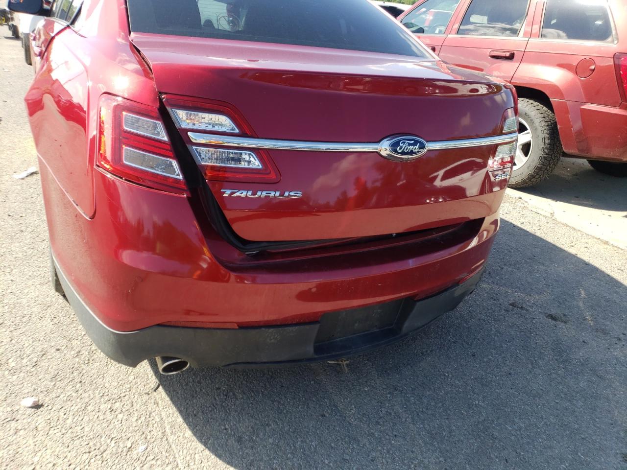 Photo 9 from auction – 2014 FORD TAURUS SEL with VIN 1FAHP2E80EG103500
