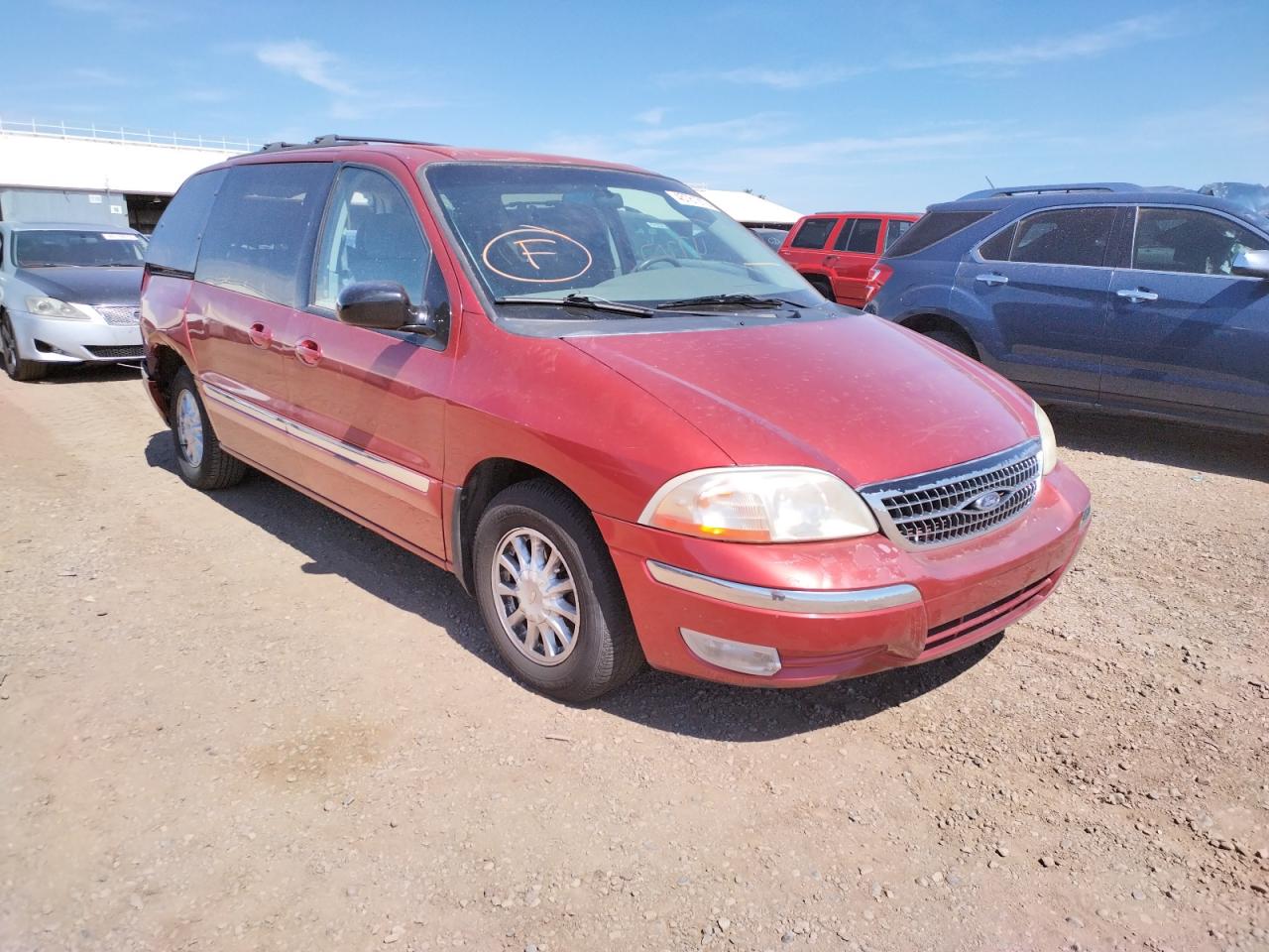 FORD WINDSTAR S 2000 with VIN 2FMZA5247YBA24867 - Photo from auction