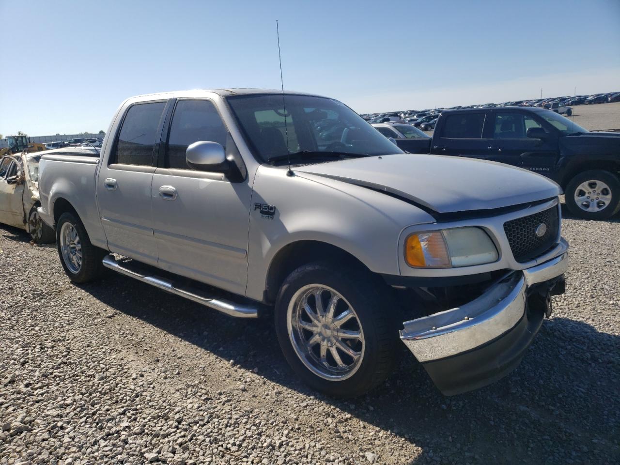 FORD F150 SUPER 2002 with VIN 1FTRW076X2KD61842 - Photo from auction