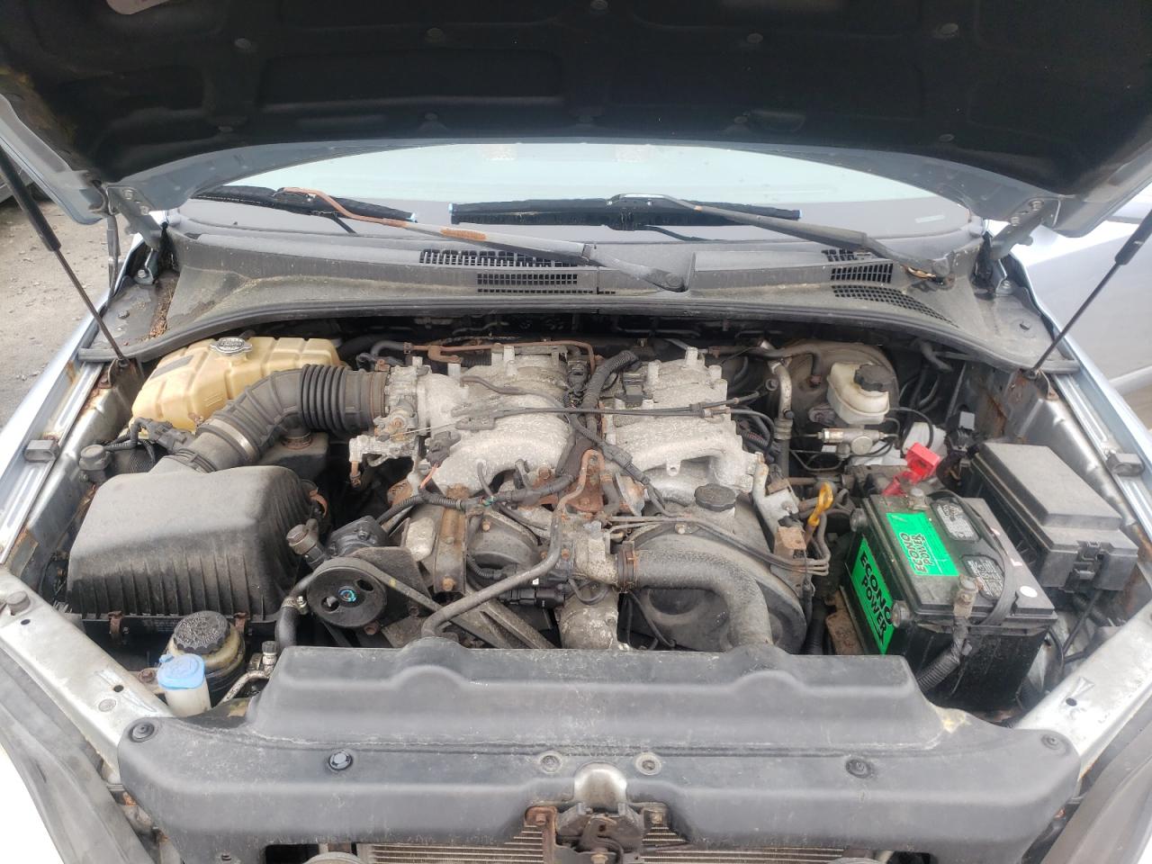 Photo 7 from auction – 2004 KIA SORENTO EX with VIN KNDJC733045324696