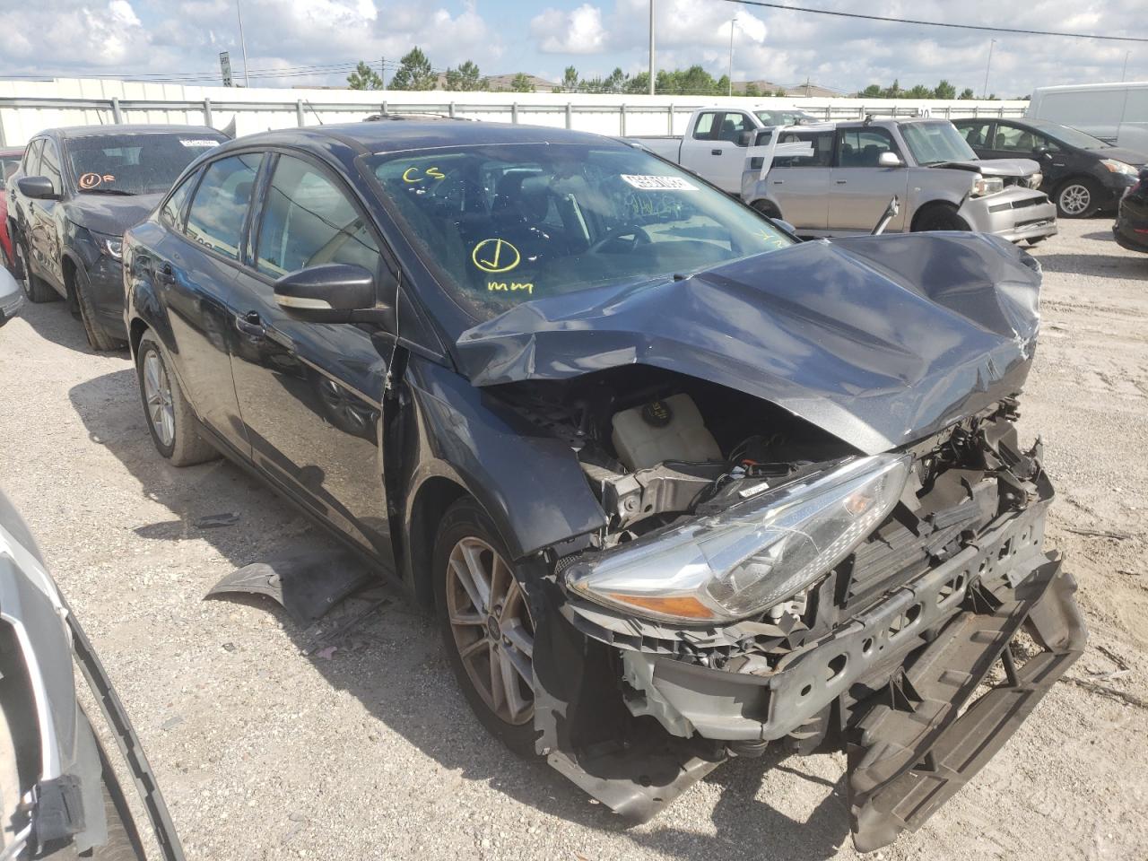 FORD FOCUS SE 2017 with VIN 1FADP3F24HL212875 - Photo from auction
