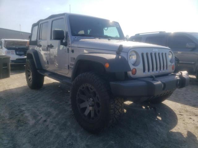 JEEP WRANGLER U 2013 with VIN 1C4BJWDG9DL673907 - Photo from auction
