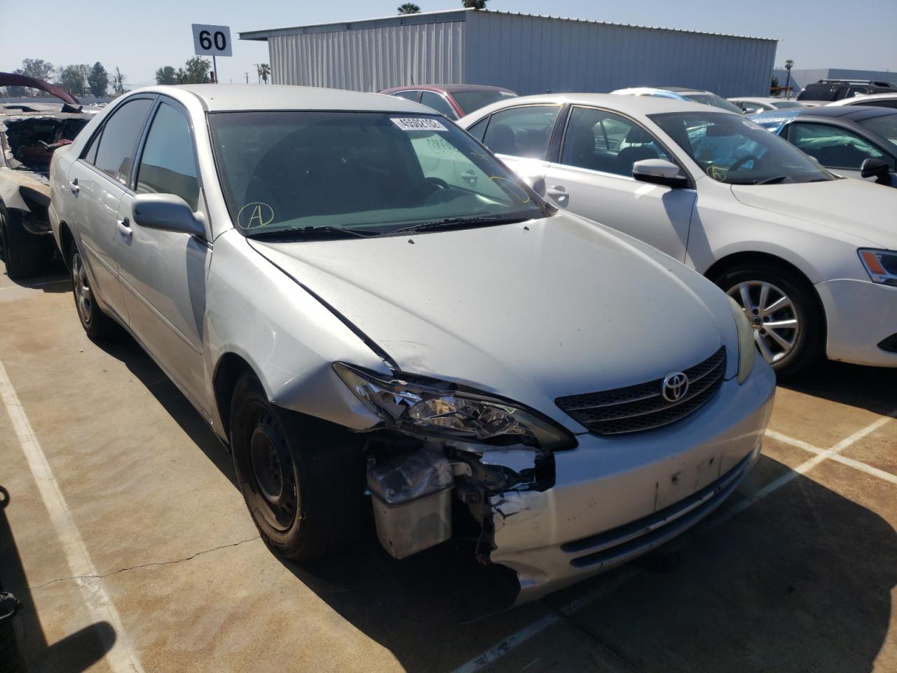 TOYOTA CAMRY LE 2002 with VIN 4T1BE32KX2U094180 - Photo from auction