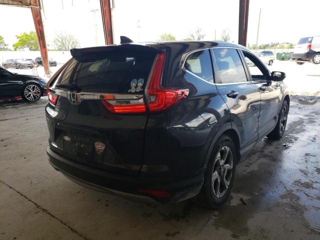 Photo 4 from auction – 2017 HONDA CR-V EX with VIN 7FARW1H55HE033704