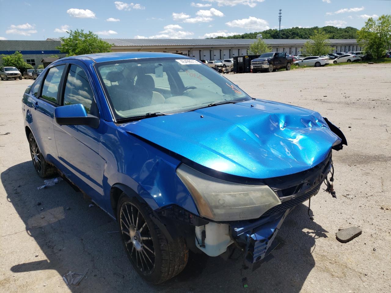 FORD FOCUS SES 2011 with VIN 1FAHP3GN7BW124595 - Photo from auction
