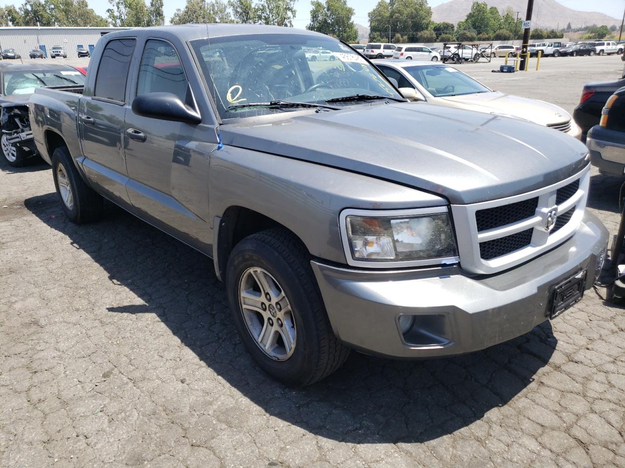DODGE DAKOTA SXT 2009 with VIN 1D7HE38K19S731328 - Photo from auction