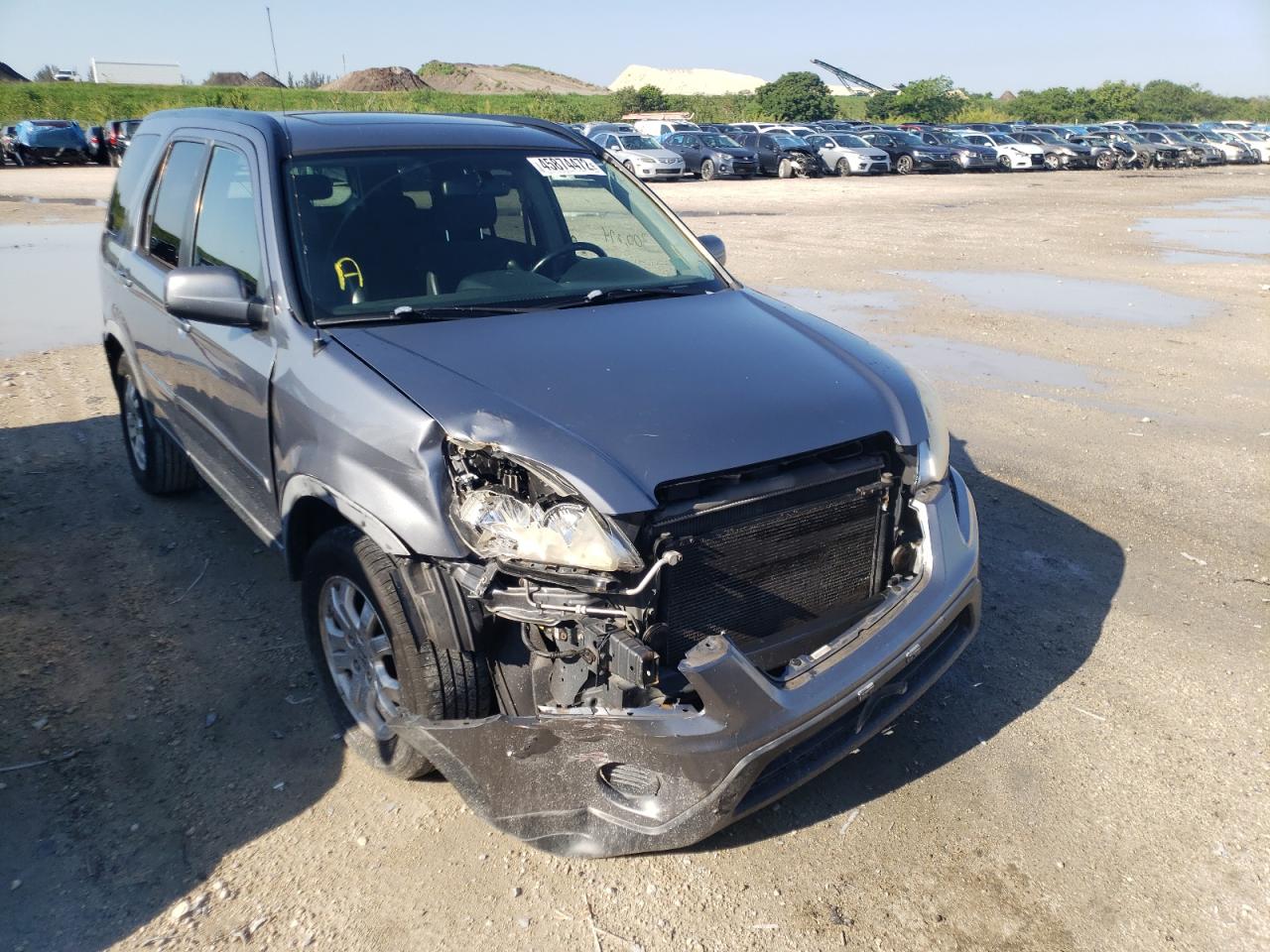 Photo 9 from auction – 2005 HONDA CR-V SE with VIN JHLRD78975C805915