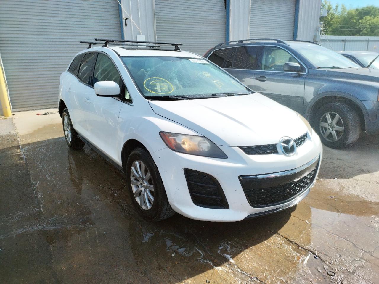 MAZDA CX-7 2010 with VIN JM3ER2W57A0333203 - Photo from auction