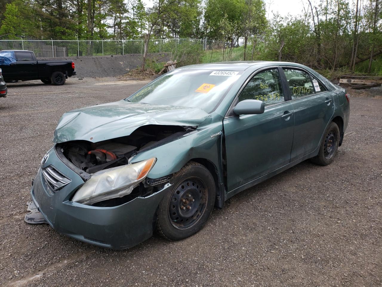 Photo 2 from auction – 2007 TOYOTA CAMRY HYBR with VIN JTNBB46K373015759
