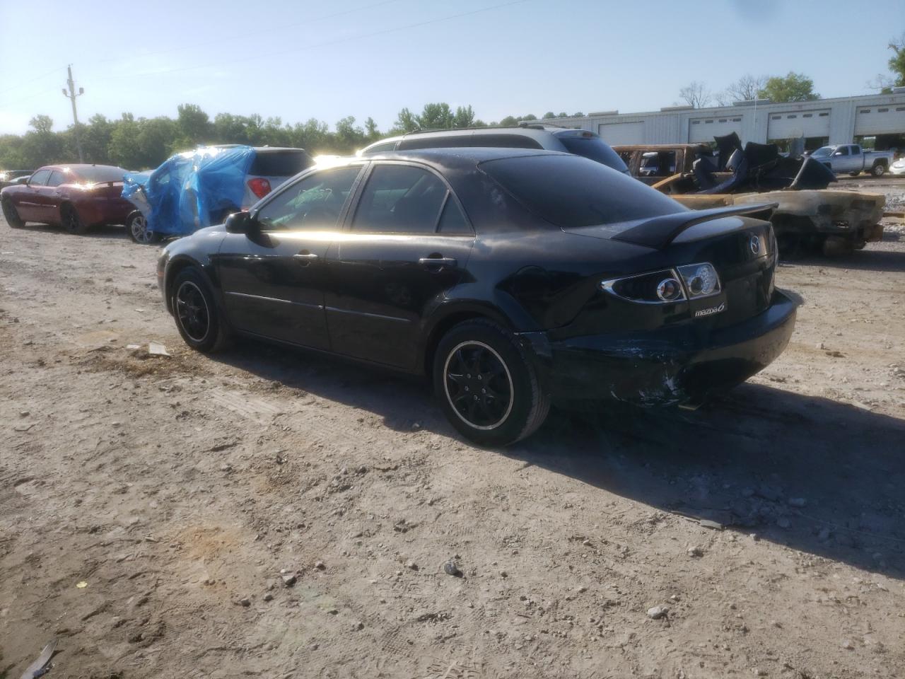 Photo 3 from auction – 2003 MAZDA 6 I with VIN 1YVFP80C635M17641