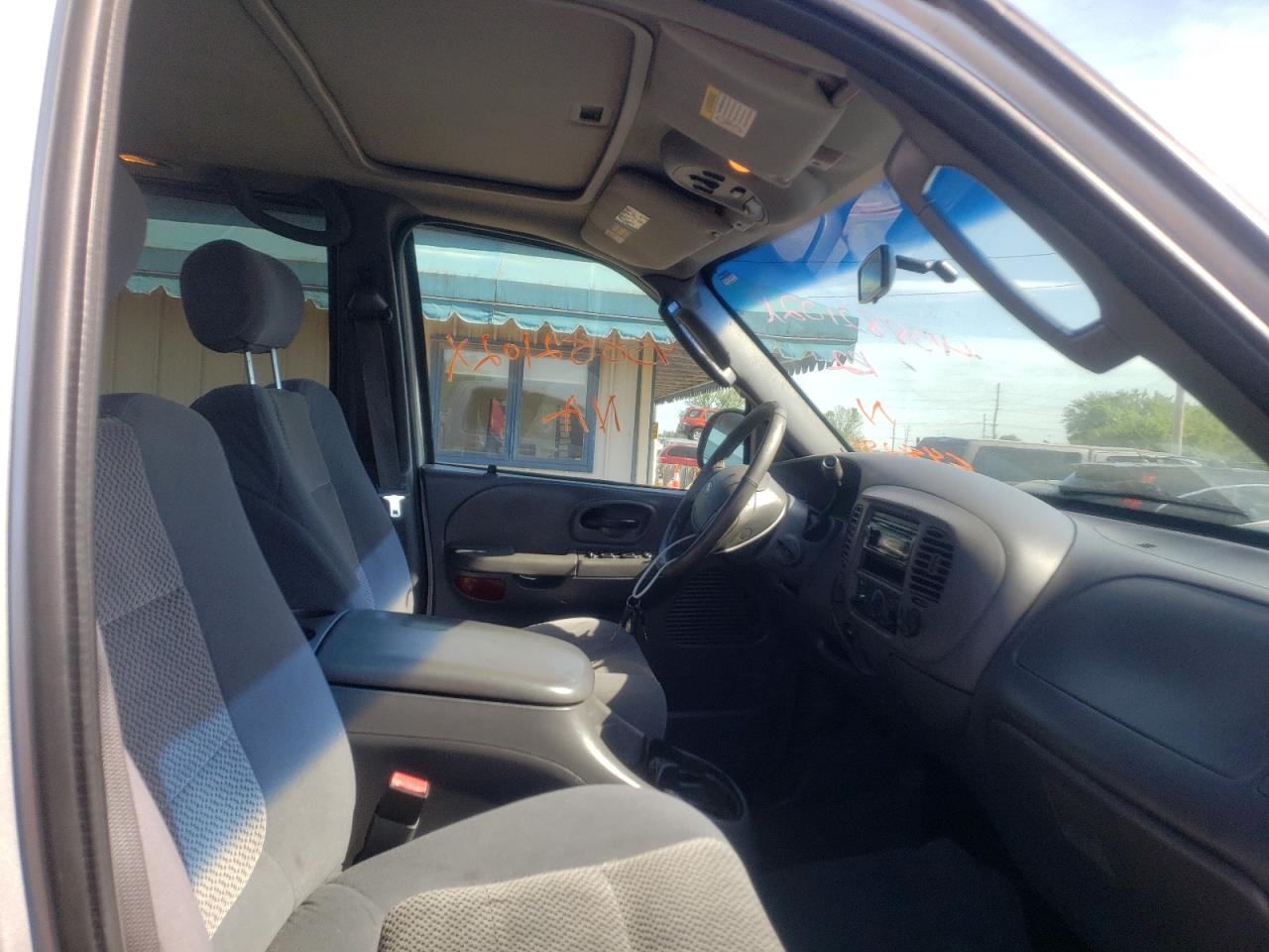 Photo 5 from auction – 2003 FORD F150 SUPER with VIN 1FTRW08L73KC48291