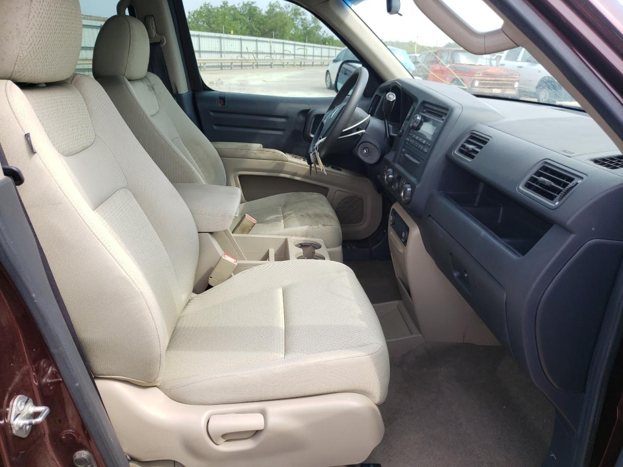 Photo 5 from auction – 2010 HONDA RIDGELINE with VIN 5FPYK1F21AB002183