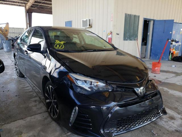 TOYOTA COROLLA L 2018 with VIN 5YFBURHE4JP768038 - Photo from auction