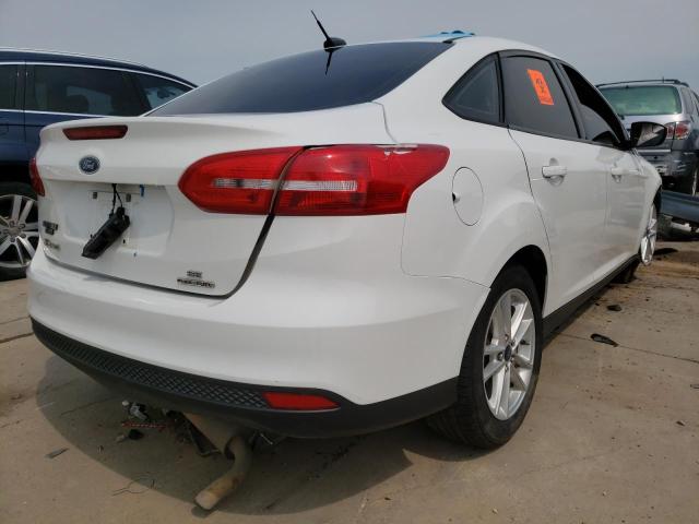 Photo 4 from auction – 2016 FORD FOCUS SE with VIN 1FADP3F2XGL277759
