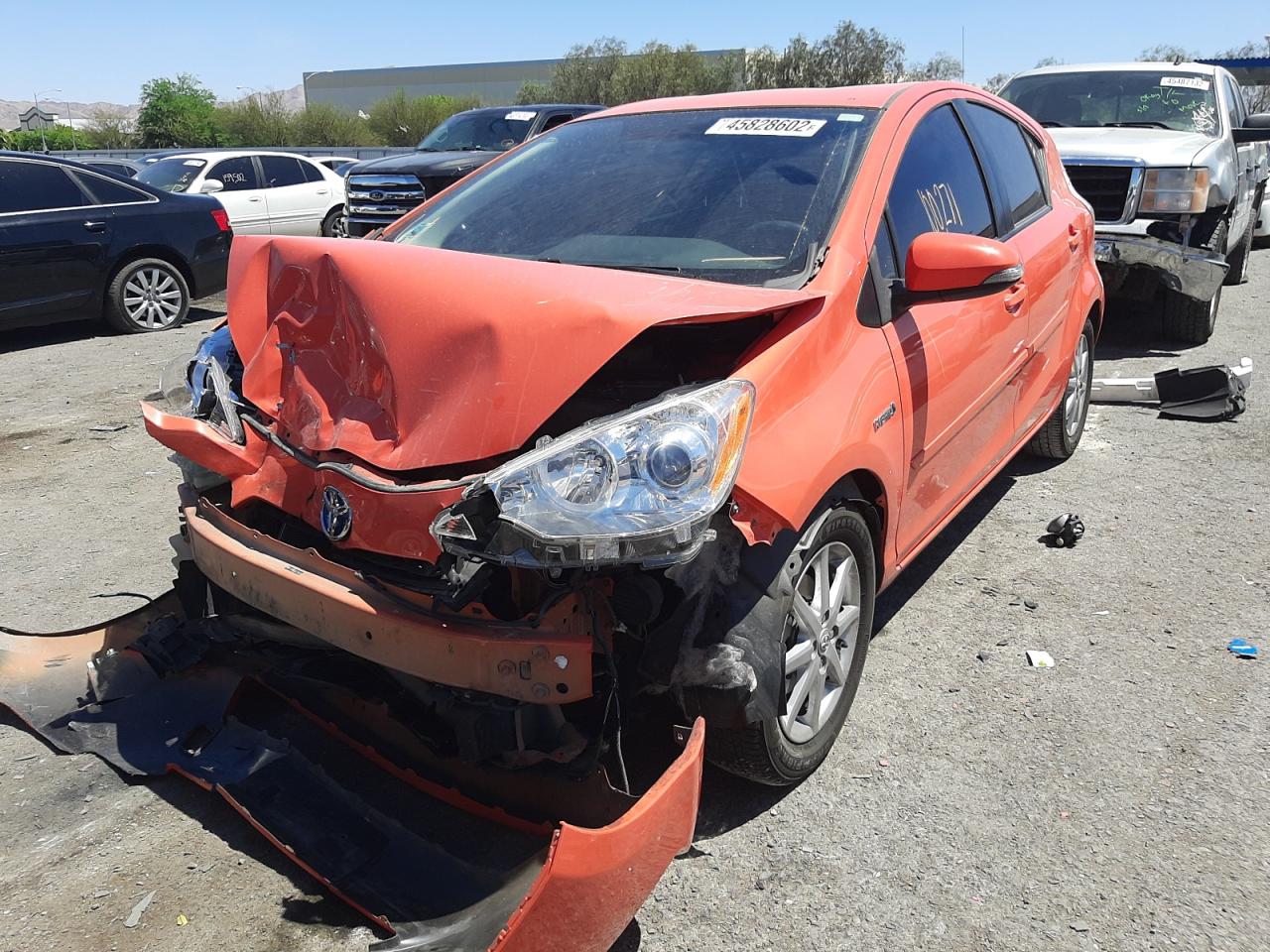 Photo 2 from auction – 2013 TOYOTA PRIUS C with VIN JTDKDTB3XD1040267