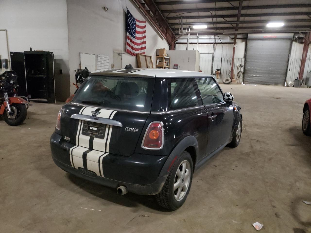 Photo 16 from auction – 2009 MINI COOPER with VIN WMWMF33599TW77159