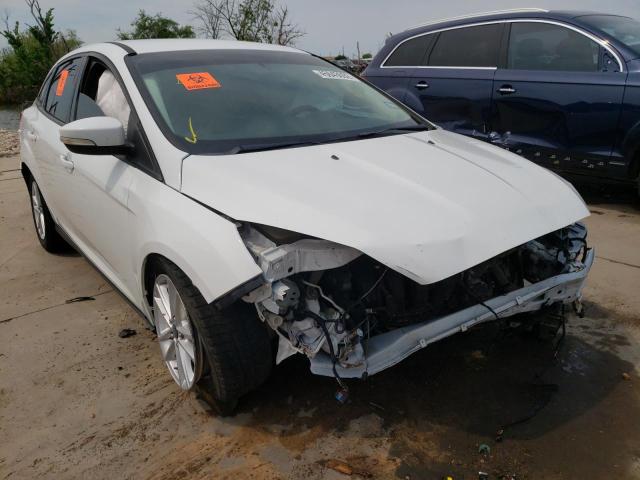 FORD FOCUS SE 2016 with VIN 1FADP3F2XGL277759 - Photo from auction